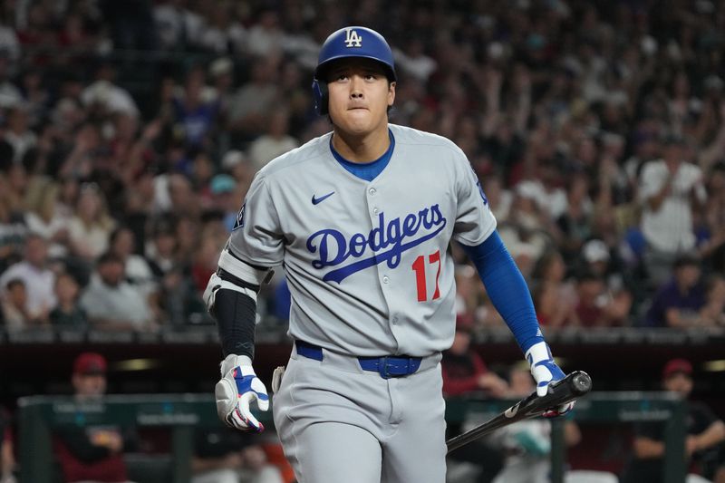 Sep 24, 2025; Phoenix, Arizona, USA; Los Angeles Dodgers two-way player Shohei Ohtani (17) hits against the Arizona Diamondbacks in the fourth inning at Chase Field. Mandatory Credit: Rick Scuteri-Imagn Images