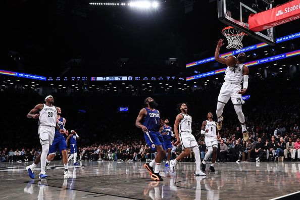 NEW YORK, NEW YORK - NOVEMBER 08: Dennis Smith Jr. #4 of the Brooklyn Nets dunks the ball during the fourth quarter of the game against the Los Angeles Clippers at Barclays Center on November 08, 2023 in the Brooklyn borough of New York City. NOTE TO USER: User expressly acknowledges and agrees that, by downloading and or using this photograph, User is consenting to the terms and conditions of the Getty Images License Agreement. (Photo by Dustin Satloff/Getty Images)