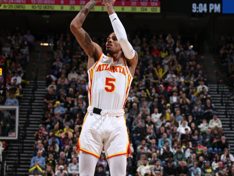 SALT LAKE CITY, UT - MARCH 15:  Dejounte Murray #5 of the Atlanta Hawks shoots the ball during the game   on March 15, 2024 at Delta Center in Salt Lake City, Utah. NOTE TO USER: User expressly acknowledges and agrees that, by downloading and or using this Photograph, User is consenting to the terms and conditions of the Getty Images License Agreement. Mandatory Copyright Notice: Copyright 2024 NBAE (Photo by Melissa Majchrzak/NBAE via Getty Images)