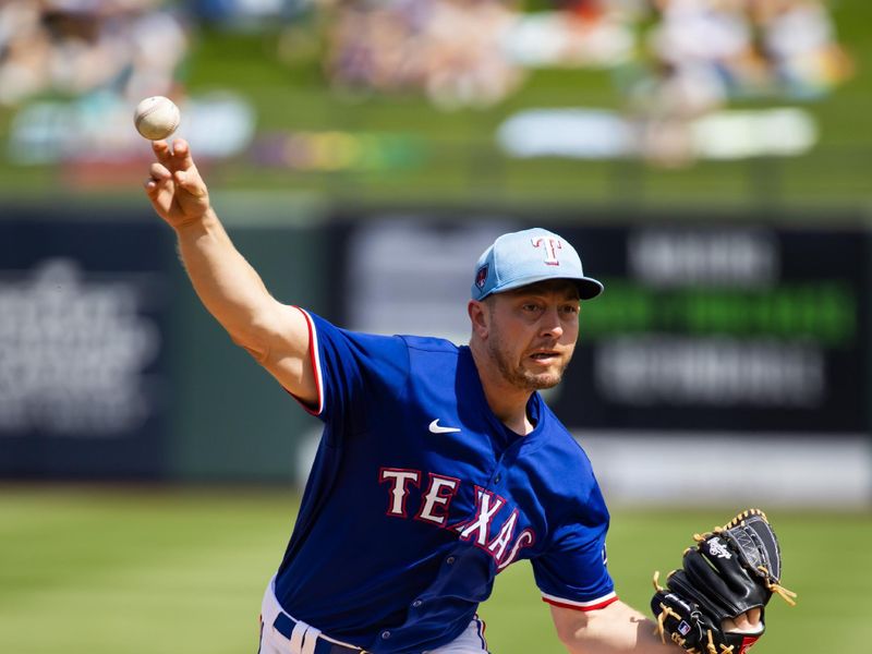 Mar 18, 2024; Surprise, Arizona, USA; Texas Rangers pitcher Adrian Sampson against the Seattle Mariners during a spring training baseball game at Surprise Stadium. Mandatory Credit: Mark J. Rebilas-USA TODAY Sports