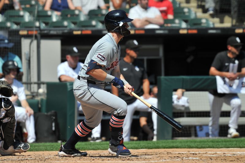 Aug 25, 2024; Chicago, Illinois, USA; Detroit Tigers second base Jace Jung (17) singles during the third inning against the Chicago White Sox at Guaranteed Rate Field. Mandatory Credit: Patrick Gorski-USA TODAY Sports