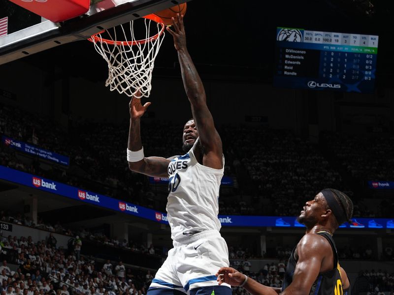 MINNEAPOLIS, MN -  MAY 6: Julius Randle #30 of the Minnesota Timberwolves drives to the basket during the game against the Golden State Warriors during Round 2 Game 1 of the 2025 NBA Playoffs on May 6, 2025 at Target Center in Minneapolis, Minnesota. NOTE TO USER: User expressly acknowledges and agrees that, by downloading and or using this Photograph, user is consenting to the terms and conditions of the Getty Images License Agreement. Mandatory Copyright Notice: Copyright 2025 NBAE (Photo by Jesse D. Garrabrant/NBAE via Getty Images)