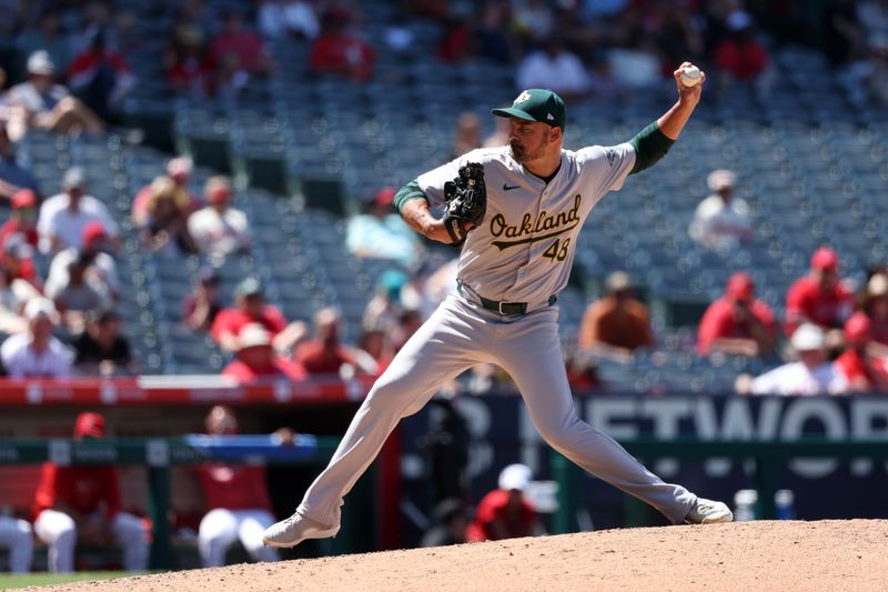 Jun 26, 2024; Anaheim, California, USA;  Oakland Athletics relief pitcher T.J. McFarland (48) pitches during the sixth inning against the Los Angeles Angels at Angel Stadium. Mandatory Credit: Kiyoshi Mio-USA TODAY Sports