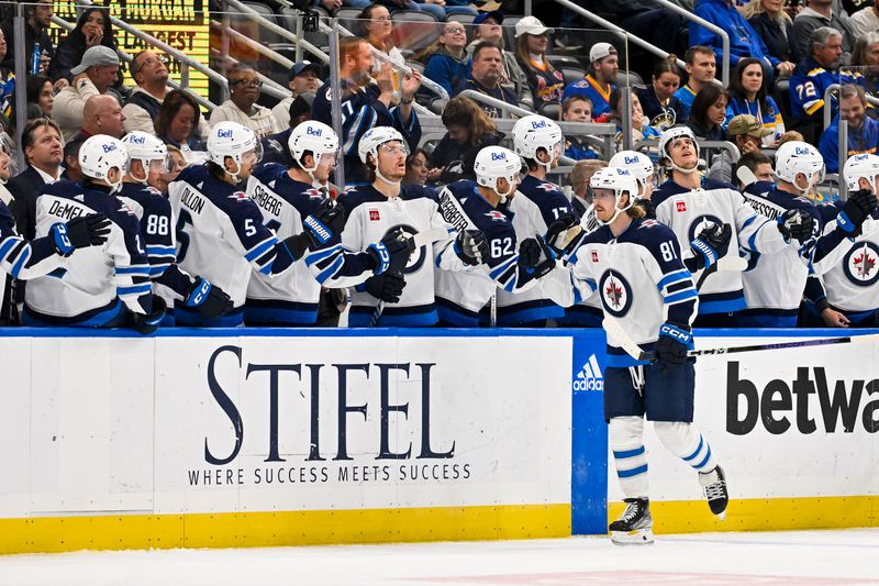 Nov 7, 2023; St. Louis, Missouri, USA;  Winnipeg Jets left wing Kyle Connor (81) is congratulated by teammates after scoring against the St. Louis Blues during the second period at Enterprise Center. Mandatory Credit: Jeff Curry-USA TODAY Sports