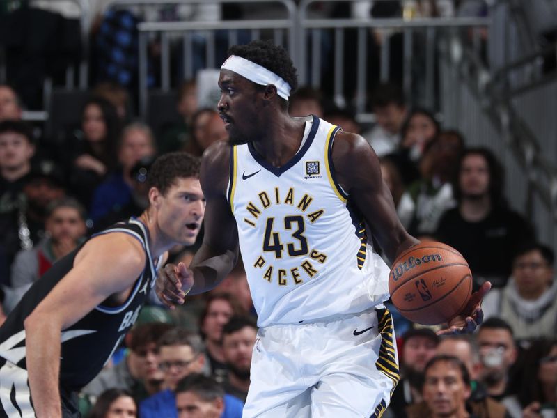 MILWAUKEE, WI - NOVEMBER 22:  Pascal Siakam #43 of the Indiana Pacers dribbles the ball during the game against the Milwaukee Bucks during a Emirates NBA Cup on November 22, 2024 at Fiserv Forum Center in Milwaukee, Wisconsin. NOTE TO USER: User expressly acknowledges and agrees that, by downloading and or using this Photograph, user is consenting to the terms and conditions of the Getty Images License Agreement. Mandatory Copyright Notice: Copyright 2024 NBAE (Photo by Gary Dineen/NBAE via Getty Images).