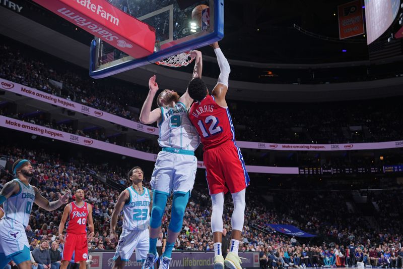 PHILADELPHIA, PA - MARCH 1: Tobias Harris #12 of the Philadelphia 76ers drives to the basket during the game against the Charlotte Hornets on March 1, 2024 at the Wells Fargo Center in Philadelphia, Pennsylvania NOTE TO USER: User expressly acknowledges and agrees that, by downloading and/or using this Photograph, user is consenting to the terms and conditions of the Getty Images License Agreement. Mandatory Copyright Notice: Copyright 2024 NBAE (Photo by Jesse D. Garrabrant/NBAE via Getty Images)