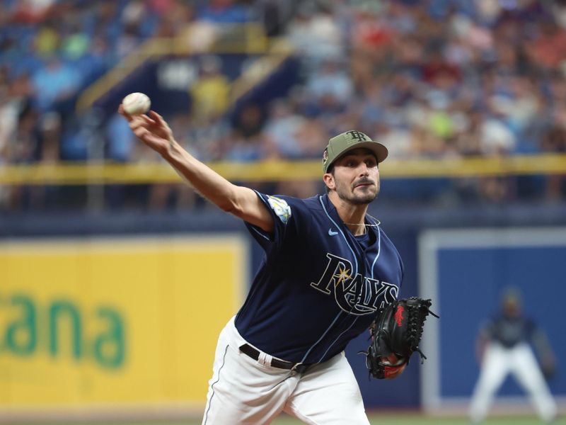 May 20, 2023; St. Petersburg, Florida, USA; Tampa Bay Rays starting pitcher Zach Eflin (24) throws a pitch during the first inning against the Milwaukee Brewers at Tropicana Field. Mandatory Credit: Kim Klement-USA TODAY Sports