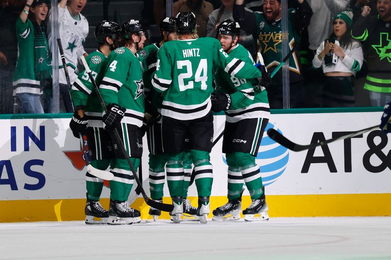 Oct 16, 2025; Dallas, Texas, USA; Dallas Stars right wing Mikko Rantanen (96) celebrates with teammates after scoring a goal against the Vancouver Canucks during the first period at American Airlines Center. Mandatory Credit: Chris Jones-Imagn Images
