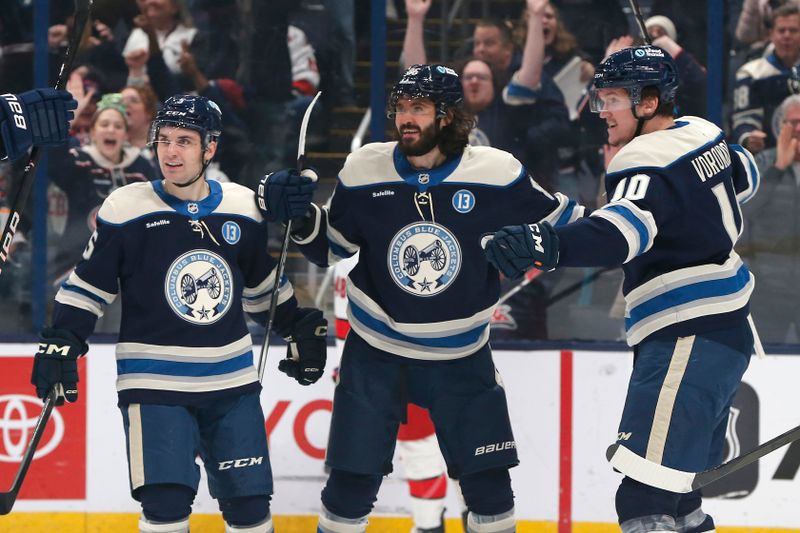 Dec 31, 2024; Columbus, Ohio, USA; Columbus Blue Jackets right wing Kirill Marchenko (86) celebrates his goal against the Carolina Hurricanes during the first period at Nationwide Arena. Mandatory Credit: Russell LaBounty-Imagn Images