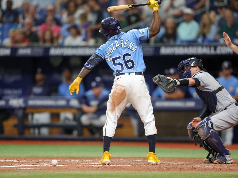 Aug 27, 2023; St. Petersburg, Florida, USA;  Tampa Bay Rays left fielder Randy Arozarena (56) reacts after getting hit by a pitch against the New York Yankees in the eighth inning at Tropicana Field. Mandatory Credit: Nathan Ray Seebeck-USA TODAY Sports