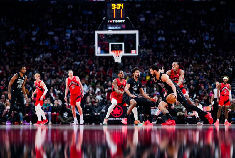 TORONTO, ON - JANUARY 1: Ben Simmons #10 of the Brooklyn Nets dribbles against the Toronto Raptors during the first half at the Scotiabank Arena on January 1, 2025 in Toronto, Ontario, Canada. NOTE TO USER: User expressly acknowledges and agrees that, by downloading and/or using this Photograph, user is consenting to the terms and conditions of the Getty Images License Agreement. (Photo by Mark Blinch/Getty Images)