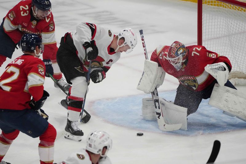 Feb 20, 2024; Sunrise, Florida, USA; Florida Panthers goaltender Sergei Bobrovsky (72) makes a save on Ottawa Senators left wing Brady Tkachuk (7) during the third period at Amerant Bank Arena. Mandatory Credit: Jim Rassol-USA TODAY Sports