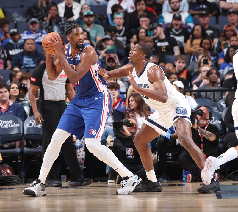 MEMPHIS, TN - APRIL 6: Trey Jemison #55 of the Memphis Grizzlies plays defense against Joel Embiid #21 of the Philadelphia 76ers on April 6, 2024 at FedExForum in Memphis, Tennessee. NOTE TO USER: User expressly acknowledges and agrees that, by downloading and or using this photograph, User is consenting to the terms and conditions of the Getty Images License Agreement. Mandatory Copyright Notice: Copyright 2024 NBAE (Photo by Joe Murphy/NBAE via Getty Images)