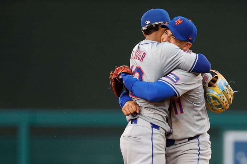 Jun 5, 2024; Washington, District of Columbia, USA; New York Mets shortstop Francisco Lindor (12) celebrates with Mets shortstop Jose Iglesias (11) after the final out against the Washington Nationals at Nationals Park. Mandatory Credit: Geoff Burke-USA TODAY Sports