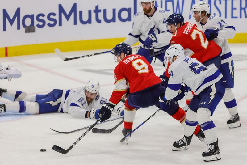 Apr 21, 2024; Sunrise, Florida, USA; Florida Panthers center Sam Bennett (9) shoots the puck against the Tampa Bay Lightning during the third period in game one of the first round of the 2024 Stanley Cup Playoffs at Amerant Bank Arena. Mandatory Credit: Sam Navarro-USA TODAY Sports