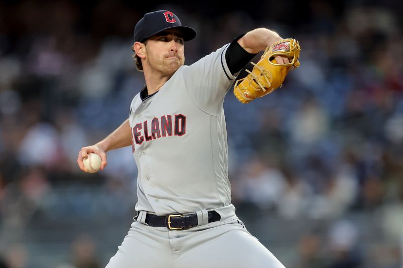 May 3, 2023; Bronx, New York, USA; Cleveland Guardians starting pitcher Shane Bieber (57) pitches against the New York Yankees during the first inning at Yankee Stadium. Mandatory Credit: Brad Penner-USA TODAY Sports