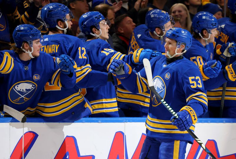 Jan 9, 2024; Buffalo, New York, USA;  Buffalo Sabres left wing Jeff Skinner (53) celebrates his goal with teammates during the first period against the Seattle Kraken at KeyBank Center. Mandatory Credit: Timothy T. Ludwig-USA TODAY Sports