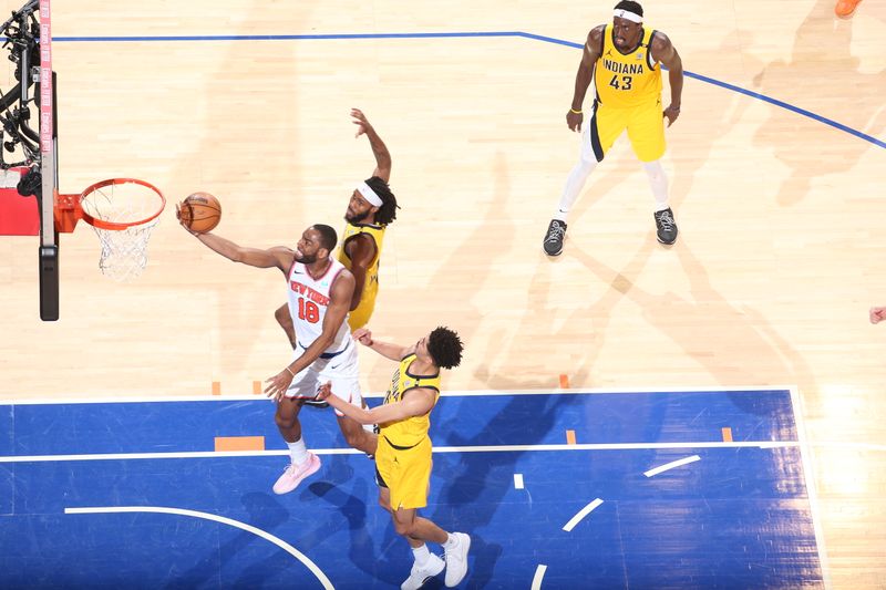 NEW YORK, NY - MAY 19: Alec Burks #18 of the New York Knicks drives to the basket during the game  against the Indiana Pacers during Round 2 Game 7 of the 2024 NBA Playoffs on May 19, 2024 at Madison Square Garden in New York City, New York.  NOTE TO USER: User expressly acknowledges and agrees that, by downloading and or using this photograph, User is consenting to the terms and conditions of the Getty Images License Agreement. Mandatory Copyright Notice: Copyright 2024 NBAE  (Photo by Nathaniel S. Butler/NBAE via Getty Images)