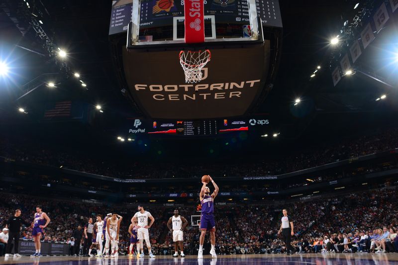 PHOENIX, AZ - APRIL 7: Devin Booker #1 of the Phoenix Suns shoots a free throw during the game against the New Orleans Pelicans on April 7, 2024 at Footprint Center in Phoenix, Arizona. NOTE TO USER: User expressly acknowledges and agrees that, by downloading and or using this photograph, user is consenting to the terms and conditions of the Getty Images License Agreement. Mandatory Copyright Notice: Copyright 2024 NBAE (Photo by Kate Frese/NBAE via Getty Images)