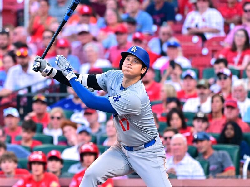 Aug 17, 2024; St. Louis, Missouri, USA; Los Angeles Dodgers designated hitter Shohei Ohtani (17) watches his ball fly out against the St. Louis Cardinals in the second inning at Busch Stadium. Mandatory Credit: Tim Vizer-USA TODAY Sports