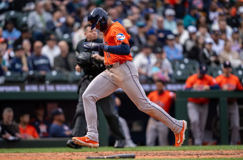 Apr 9, 2025; Seattle, Washington, USA;  Right fielder Cam Smith (11) scores a run during the eighth inning against the Seattle Mariners at T-Mobile Park. Mandatory Credit: Stephen Brashear-Imagn Images