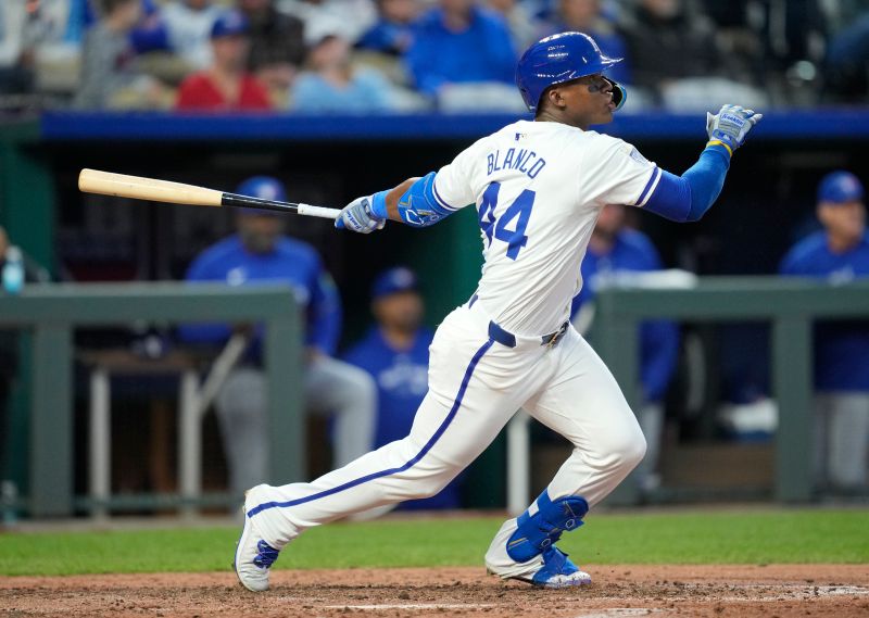 Apr 22, 2024; Kansas City, Missouri, USA; Kansas City Royals left fielder Dairon Blanco (44) hits a double during the sixth inning against the Toronto Blue Jays at Kauffman Stadium. Mandatory Credit: Jay Biggerstaff-USA TODAY Sports