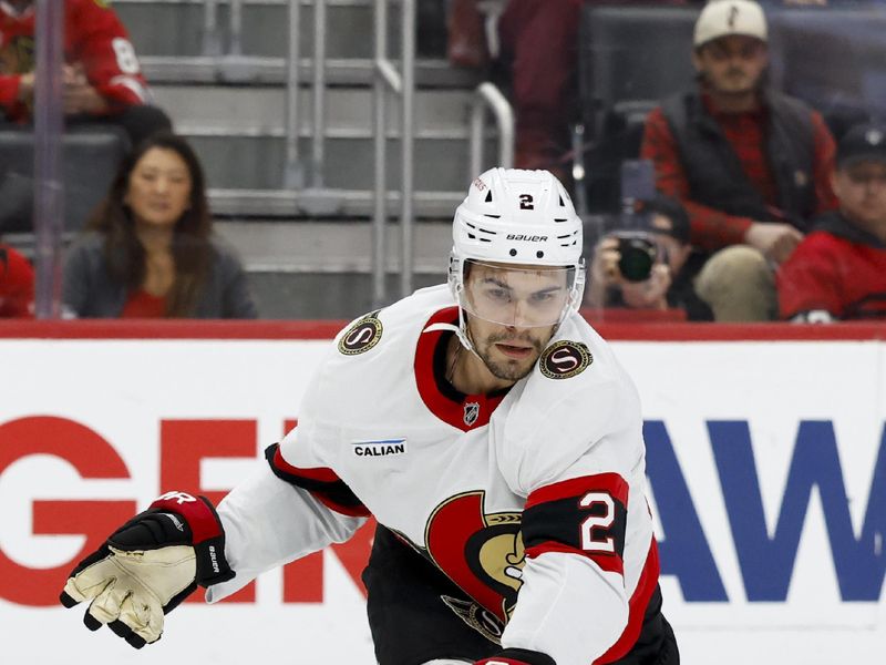 Jan 7, 2025; Detroit, Michigan, USA; Ottawa Senators defenseman Artem Zub (2) skates with the puck in the third period against the Detroit Red Wings at Little Caesars Arena. Mandatory Credit: Rick Osentoski-Imagn Images
