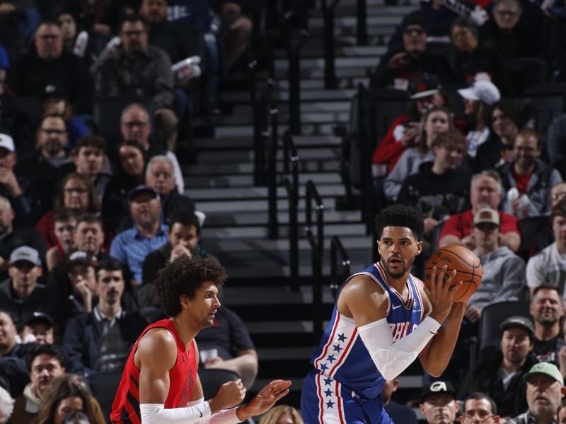 PORTLAND, OR - JANUARY 29: Tobias Harris #12 of the Philadelphia 76ers handles the ball against Matisse Thybulle #4 of the Portland Trail Blazers during the game on January 29, 2024 at the Moda Center Arena in Portland, Oregon. NOTE TO USER: User expressly acknowledges and agrees that, by downloading and or using this photograph, user is consenting to the terms and conditions of the Getty Images License Agreement. Mandatory Copyright Notice: Copyright 2024 NBAE (Photo by Cameron Browne/NBAE via Getty Images)