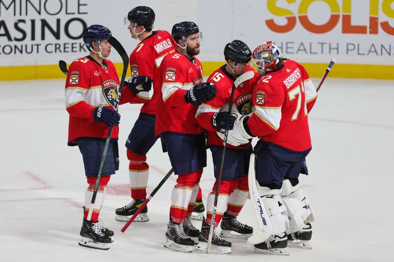 Feb 27, 2024; Sunrise, Florida, USA; Florida Panthers goaltender Sergei Bobrovsky (72) celebrates with teammates after winning the game against the Buffalo Sabres at Amerant Bank Arena. Mandatory Credit: Sam Navarro-USA TODAY Sports