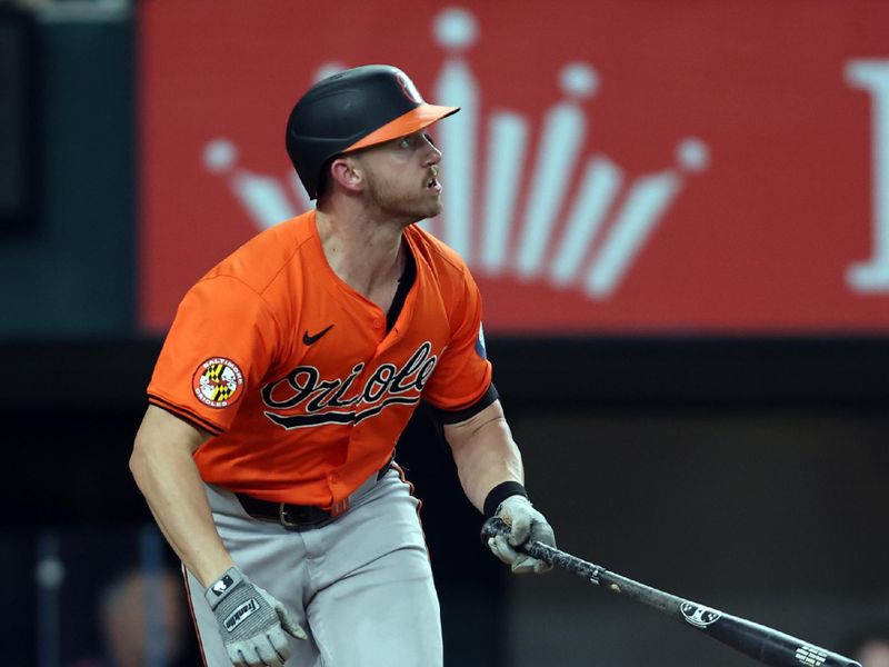Jul 20, 2024; Arlington, Texas, USA; Baltimore Orioles second base Jordan Westburg (11) hits a two run home run against the Texas Rangers in the sixth inning at Globe Life Field. Mandatory Credit: Tim Heitman-USA TODAY Sports