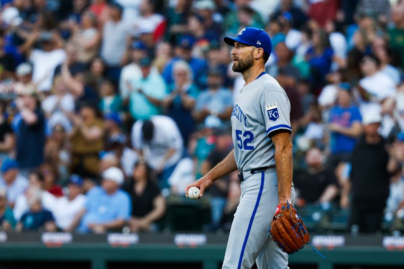 Jun 30, 2025; Seattle, Washington, USA; Kansas City Royals starting pitcher Michael Wacha (52) returns to the mound after surrendering a run against the Seattle Mariners during the fifth inning at T-Mobile Park. Mandatory Credit: Joe Nicholson-Imagn Images