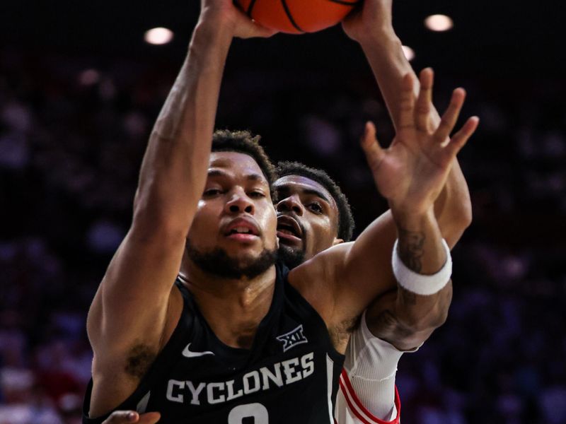 Jan 27, 2025; Tucson, Arizona, USA; Arizona Wildcats guard KJ Lewis (5) fouls Iowa States Cyclones forward Joshua Jefferson (2) during the second half at McKale Center. Mandatory Credit: Aryanna Frank-Imagn Images