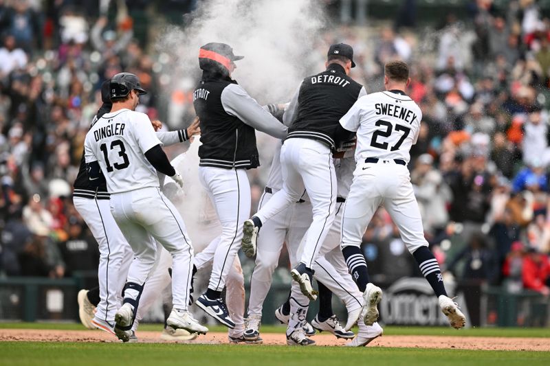 Apr 6, 2025; Detroit, Michigan, USA;  Detroit Tigers first baseman Spencer Torkelson (20) gets swarmed by his teammates after hitting a game-winning two-run walk off double against the Chicago White Sox in the ninth inning at Comerica Park. Mandatory Credit: Lon Horwedel-Imagn Images