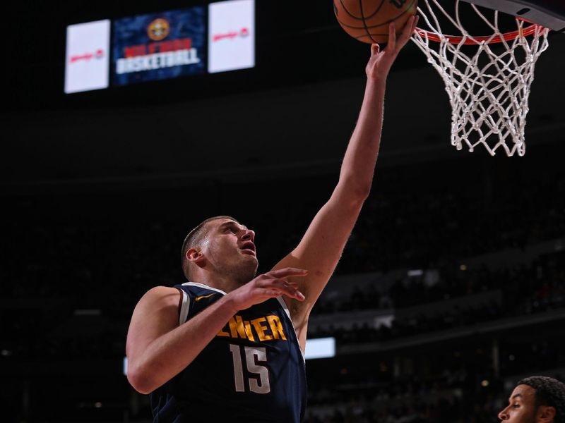 DENVER, CO - FEBRUARY 14: Nikola Jokic #15 of the Denver Nuggets drives to the basket during the game against the Sacramento Kings on February 14, 2024 at the Ball Arena in Denver, Colorado. NOTE TO USER: User expressly acknowledges and agrees that, by downloading and/or using this Photograph, user is consenting to the terms and conditions of the Getty Images License Agreement. Mandatory Copyright Notice: Copyright 2024 NBAE (Photo by Bart Young/NBAE via Getty Images)