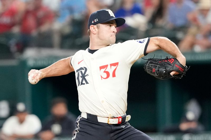 Jun 21, 2024; Arlington, Texas, USA; Texas Rangers relief pitcher David Robertson (37) delivers a pitch to the Kansas City Royals during the eighth inning at Globe Life Field. Mandatory Credit: Jim Cowsert-USA TODAY Sports