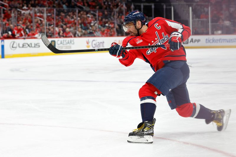 Jan 11, 2024; Washington, District of Columbia, USA; Washington Capitals left wing Alex Ovechkin (8) shoots the puck against the Seattle Kraken in the third period at Capital One Arena. Mandatory Credit: Geoff Burke-USA TODAY Sports