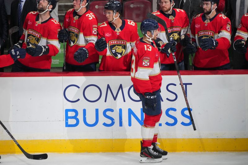 Sep 30, 2024; Sunrise, Florida, USA; Florida Panthers center Sam Reinhart (13) celebrates a goal against the Tampa Bay Lightning during the third period at Amerant Bank Arena. Mandatory Credit: Jim Rassol-Imagn Images