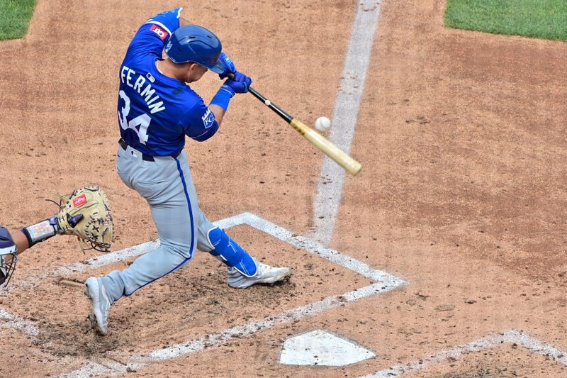 Mar 12, 2024; Salt River Pima-Maricopa, Arizona, USA;  Kansas City Royals catcher Freddy Fermin (34) grounds out in the third inning against the Colorado Rockies during a spring training game at Salt River Fields at Talking Stick. Mandatory Credit: Matt Kartozian-USA TODAY Sports