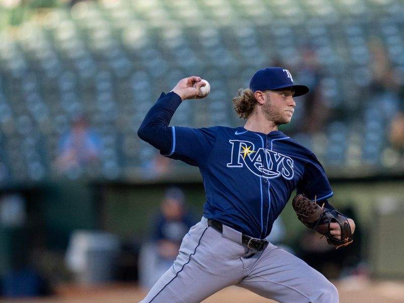 Aug 20, 2024; Oakland, California, USA; Tampa Bay Rays starting pitcher Shane Baz (11) delivers a pitch against the Oakland Athletics during the first inning at Oakland-Alameda County Coliseum. Mandatory Credit: Neville E. Guard-USA TODAY Sports