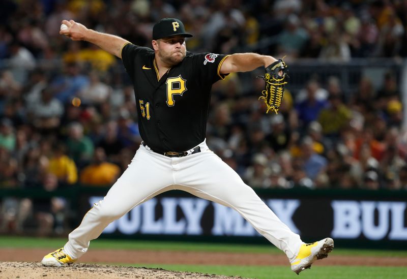 Jul 15, 2023; Pittsburgh, Pennsylvania, USA;  Pittsburgh Pirates relief pitcher David Bednar (51) throws against the San Francisco Giants during the eighth inning at PNC Park. Mandatory Credit: Charles LeClaire-USA TODAY Sports