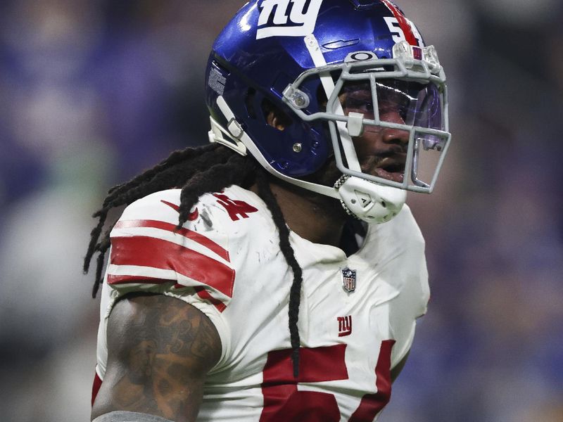 New York Giants linebacker Jaylon Smith (54) in action against the Minnesota Vikings during the second half of an NFL wild-card football game Sunday, Jan. 15, 2023 in Minneapolis. (AP Photo/Stacy Bengs)