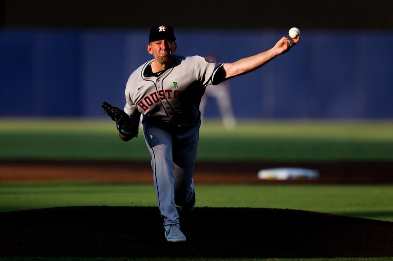 May 19, 2025; Tampa, Florida, USA; Houston Astros starting pitcher Colton Gordon (61) throws a pitch against the Tampa Bay Rays in the second inning at George M. Steinbrenner Field. Mandatory Credit: Nathan Ray Seebeck-Imagn Images