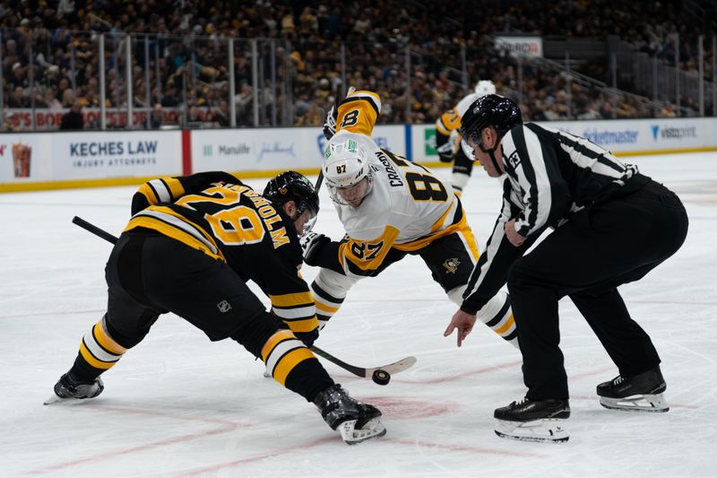Jan 11, 2026; Boston, Massachusetts, USA; Pittsburgh Penguins center Sidney Crosby (87) takes a face-off against Boston Bruins center Elias Lindholm (28) during the second period of the game at TD Garden. Mandatory Credit: Natalie Reid-Imagn Images