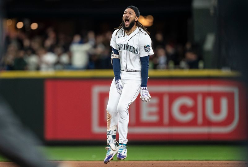 Sep 28, 2023; Seattle, Washington, USA; Seattle Mariners shortstop J.P. Crawford (3) celebrates after a game against the Texas Rangers at T-Mobile Park. Mandatory Credit: Stephen Brashear-USA TODAY Sports