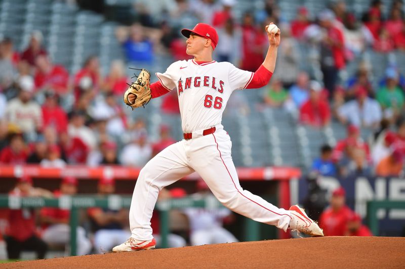 Aug 30, 2024; Anaheim, California, USA; Los Angeles Angels pitcher Samuel Aldegheri (66) throws against the Seattle Mariners during the first inning in his major league debut at Angel Stadium. Mandatory Credit: Gary A. Vasquez-USA TODAY Sports