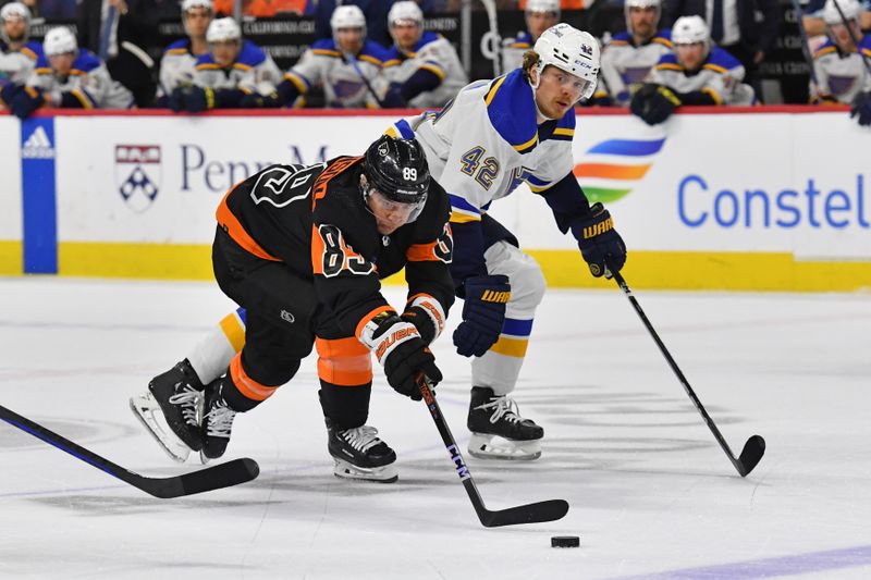 Mar 4, 2024; Philadelphia, Pennsylvania, USA; Philadelphia Flyers right wing Cam Atkinson (89) ands St. Louis Blues right wing Kasperi Kapanen (42) battle for the puck during the second period at Wells Fargo Center. Mandatory Credit: Eric Hartline-USA TODAY Sports