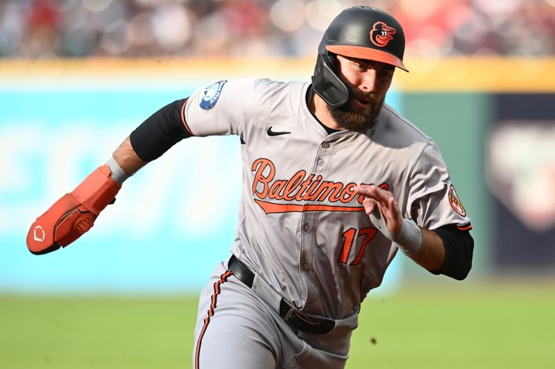 Aug 1, 2024; Cleveland, Ohio, USA; Baltimore Orioles left fielder Colton Cowser (17) rounds third base en route to scoring  at Progressive Field. Mandatory Credit: Ken Blaze-USA TODAY Sports