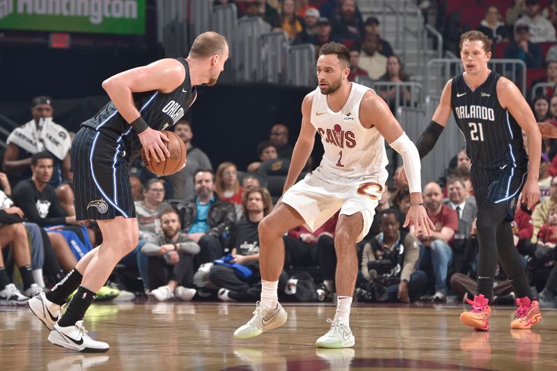 CLEVELAND, OH - FEBRUARY 22: Max Strus #1 of the Cleveland Cavaliers plays defense during the game against the Orlando Magic on February 22, 2024 at Rocket Mortgage FieldHouse in Cleveland, Ohio. NOTE TO USER: User expressly acknowledges and agrees that, by downloading and/or using this Photograph, user is consenting to the terms and conditions of the Getty Images License Agreement. Mandatory Copyright Notice: Copyright 2024 NBAE (Photo by David Liam Kyle/NBAE via Getty Images)