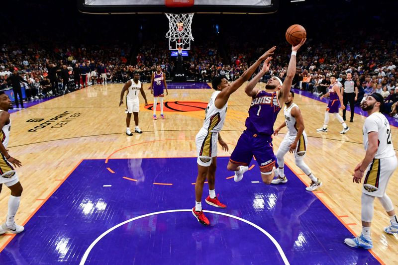 PHOENIX, AZ - APRIL 7: Devin Booker #1 of the Phoenix Suns shoots the ball during the game against the New Orleans Pelicans on April 7, 2024 at Footprint Center in Phoenix, Arizona. NOTE TO USER: User expressly acknowledges and agrees that, by downloading and or using this photograph, user is consenting to the terms and conditions of the Getty Images License Agreement. Mandatory Copyright Notice: Copyright 2024 NBAE (Photo by Kate Frese/NBAE via Getty Images)