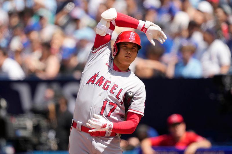 Jul 30, 2023; Toronto, Ontario, CAN; Los Angeles Angels designated hitter Shohei Ohtani (17) stretches during an at bat against the Toronto Blue Jays during the seventh inning at Rogers Centre. Mandatory Credit: John E. Sokolowski-USA TODAY Sports